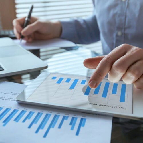 businessman working with financial report charts, business analytics and KPI, finance concept